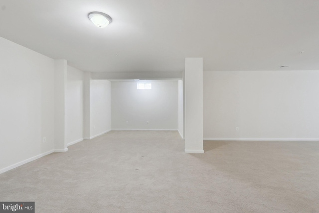 11202 King Gallahan Ct, Clinton, MD 20735 - below grade area featuring light carpet and baseboards