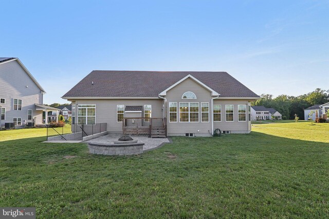 11202 King Gallahan Ct, Clinton, MD 20735 - back of house featuring a yard, a fire pit, central AC unit, and a deck