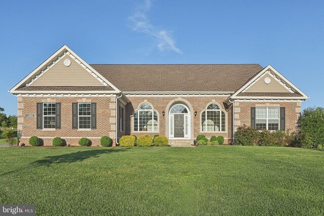 11202 King Gallahan Ct, Clinton, MD 20735 - colonial-style house with brick siding, a front yard, and a shingled roof