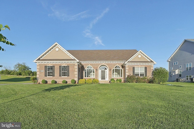 11202 King Gallahan Ct, Clinton, MD 20735 - view of front of home featuring brick siding and a front yard