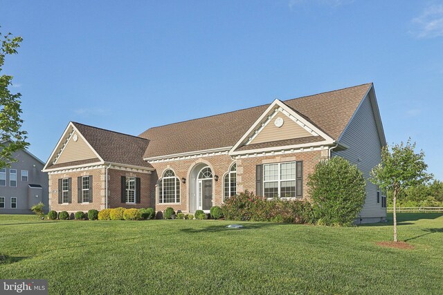11202 King Gallahan Ct, Clinton, MD 20735 - view of front of home featuring brick siding, a front lawn, and a shingled roof