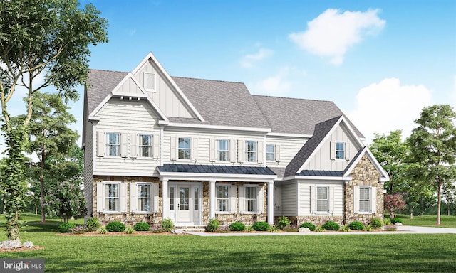 657 N Heilbron Dr, Media, PA 19063 - view of front of property featuring board and batten siding, a standing seam roof, stone siding, and a front yard