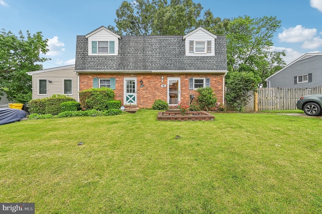 225 Dunlap Rd, Pasadena, MD 21122 - view of front facade featuring brick siding, entry steps, and roof with shingles
