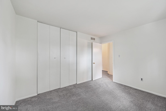 225 Dunlap Rd, Pasadena, MD 21122 - unfurnished bedroom featuring carpet flooring, a closet, and baseboards