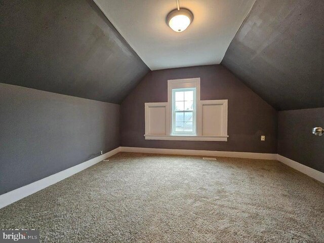 413 10th Ave, Altoona, PA 16602 - bonus room featuring baseboards, carpet floors, and lofted ceiling