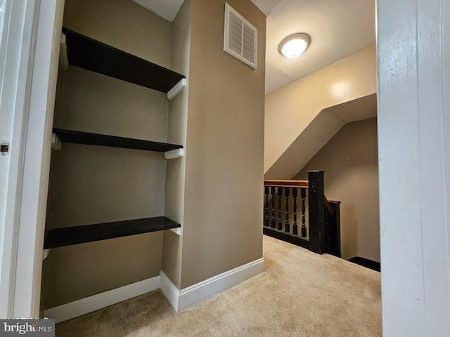 413 10th Ave, Altoona, PA 16602 - corridor with an upstairs landing, carpet flooring, and baseboards