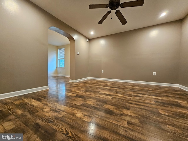 413 10th Ave, Altoona, PA 16602 - empty room featuring arched walkways, a ceiling fan, dark wood-type flooring, baseboards, and recessed lighting