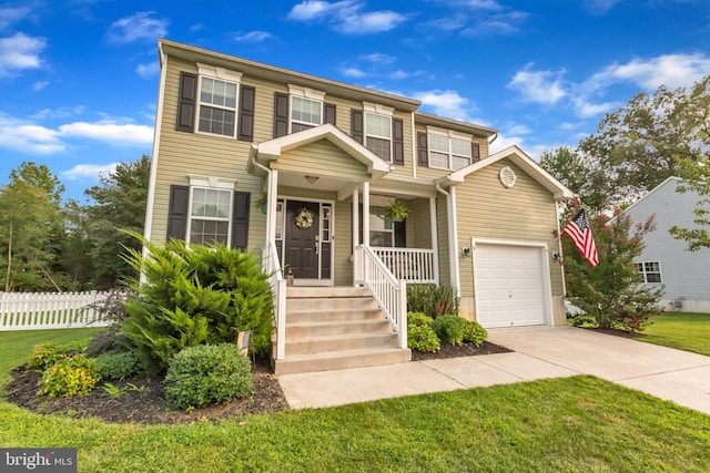 6 Hedwig Ct, Voorhees, NJ 08043 - view of front of property with driveway, a garage, and covered porch