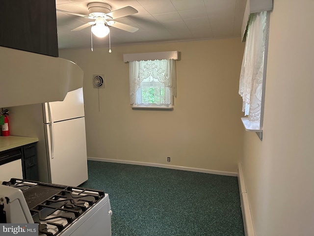 206 Taylor Rd, Wilmington, DE 19804 - kitchen featuring gas range, a ceiling fan, baseboards, freestanding refrigerator, and carpet