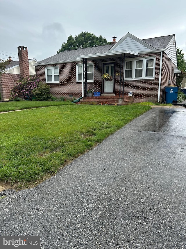206 Taylor Rd, Wilmington, DE 19804 - ranch-style house with brick siding and a front yard