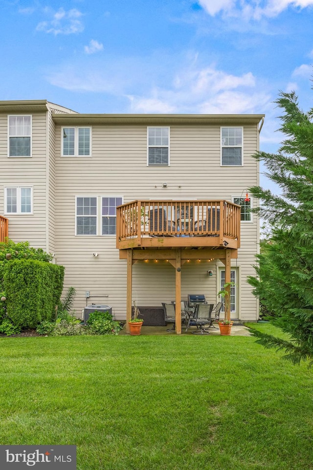 129 Helen Dr, Cinnaminson, NJ 08077 - back of property with a yard, a wooden deck, and a patio area