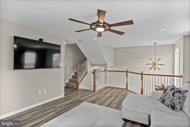 129 Helen Dr, Cinnaminson, NJ 08077 - living area with a ceiling fan, wood finished floors, recessed lighting, and a chandelier