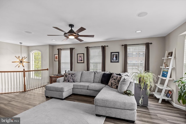 129 Helen Dr, Cinnaminson, NJ 08077 - living room featuring ceiling fan, wood finished floors, recessed lighting, and a chandelier