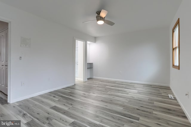 69 Drexel Pl, New Cumberland, PA 17070 - unfurnished room with a ceiling fan, light wood-type flooring, and baseboards
