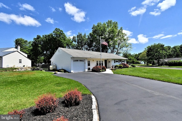 985 Jeffrey Dr, Southampton, PA 18966 - ranch-style home with a garage, driveway, and a front lawn