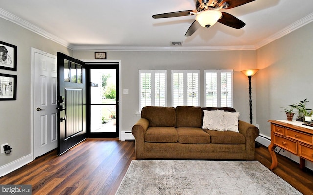 985 Jeffrey Dr, Southampton, PA 18966 - living area featuring baseboard heating, dark wood finished floors, ornamental molding, ceiling fan, and baseboards