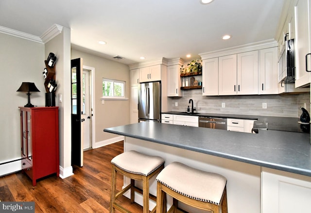 985 Jeffrey Dr, Southampton, PA 18966 - kitchen featuring appliances with stainless steel finishes, dark countertops, open shelves, backsplash, and recessed lighting