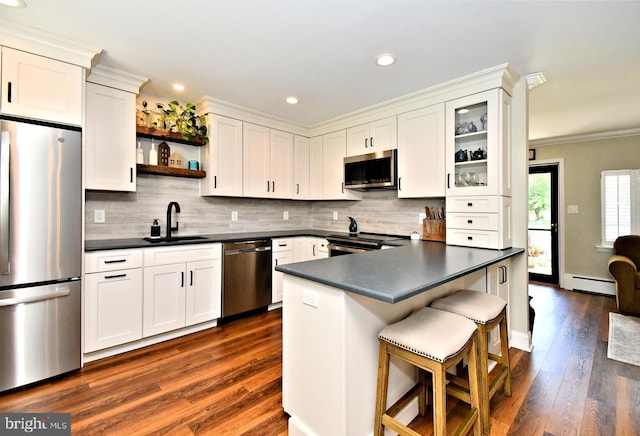 985 Jeffrey Dr, Southampton, PA 18966 - kitchen featuring appliances with stainless steel finishes, a sink, dark countertops, open shelves, and white cabinetry