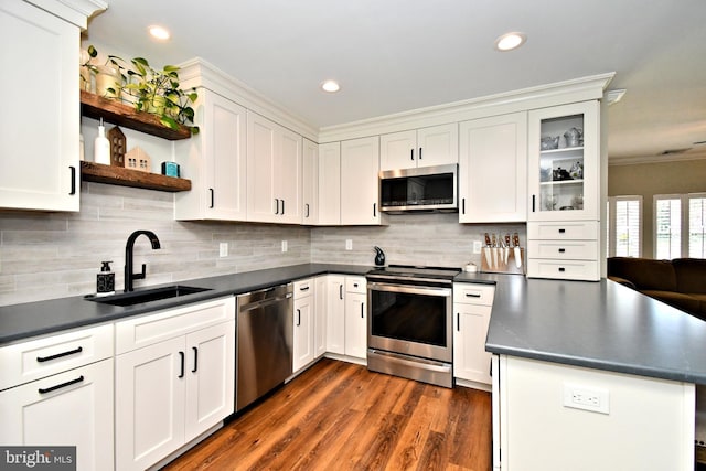 985 Jeffrey Dr, Southampton, PA 18966 - kitchen with appliances with stainless steel finishes, open shelves, a sink, dark countertops, and white cabinetry