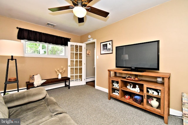 985 Jeffrey Dr, Southampton, PA 18966 - living area with carpet floors, baseboards, ceiling fan, and a baseboard radiator