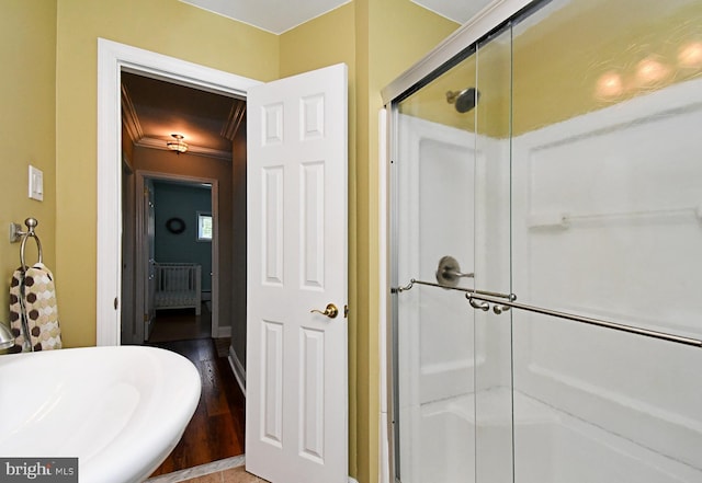 985 Jeffrey Dr, Southampton, PA 18966 - full bath featuring a stall shower, ornamental molding, and wood finished floors