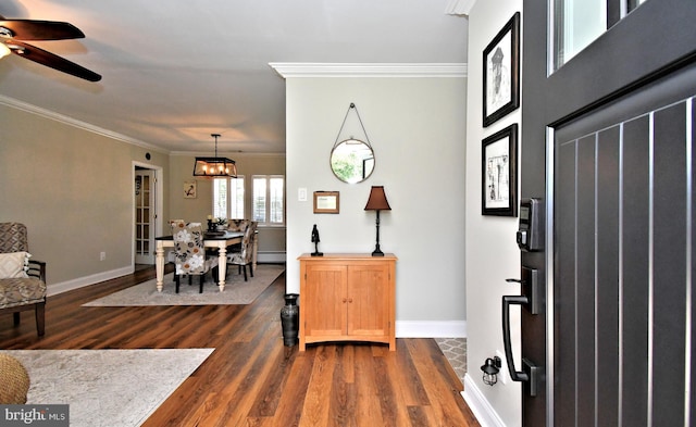 985 Jeffrey Dr, Southampton, PA 18966 - entryway featuring dark wood-style flooring, crown molding, a baseboard radiator, baseboards, and ceiling fan