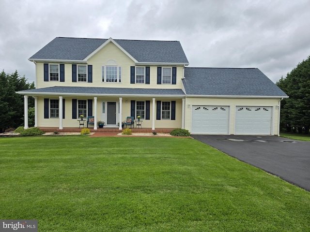 6120 Vantage Ct, Boonsboro, MD 21713 - colonial inspired home with driveway, an attached garage, a shingled roof, covered porch, and a front yard