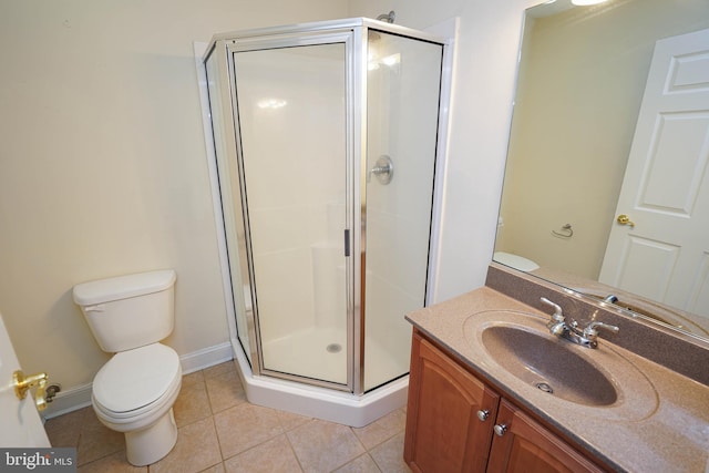 224 Canal Park Dr Unit 104, Salisbury, MD 21804 - bathroom with toilet, a shower stall, vanity, tile patterned flooring, and baseboards