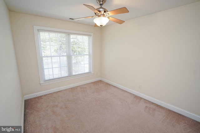 224 Canal Park Dr Unit 104, Salisbury, MD 21804 - carpeted spare room with baseboards and ceiling fan