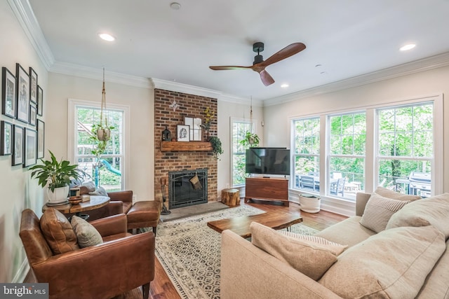 166 Nutwell Rd, Deale, MD 20751 - living area with wood finished floors, a ceiling fan, a fireplace, recessed lighting, and ornamental molding