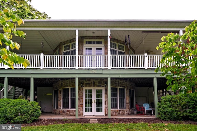 170 Vaughndom Way, Martinsburg, WV 25404 - back of property with stone siding, a patio area, a deck, and french doors