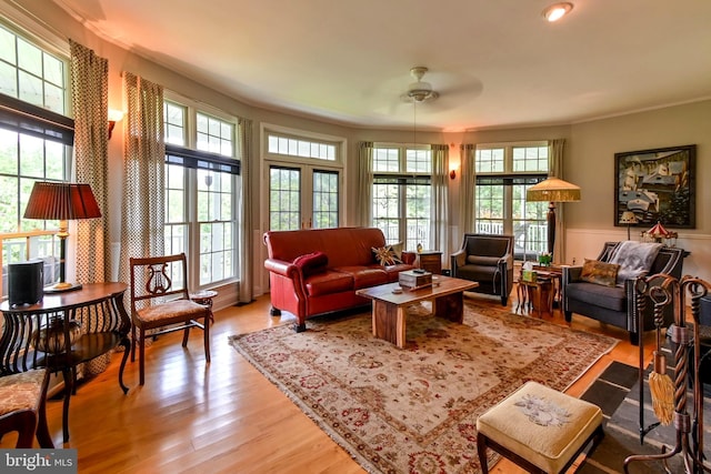 170 Vaughndom Way, Martinsburg, WV 25404 - living area with plenty of natural light, ceiling fan, crown molding, and light wood-style flooring