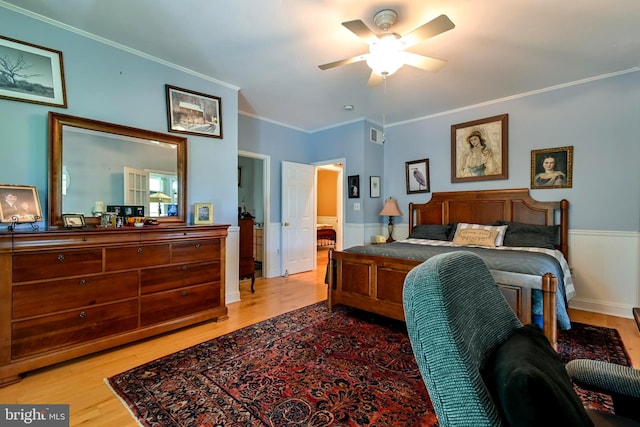 170 Vaughndom Way, Martinsburg, WV 25404 - bedroom featuring light wood-style floors, ornamental molding, and wainscoting