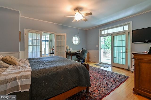 170 Vaughndom Way, Martinsburg, WV 25404 - bedroom featuring access to outside, wainscoting, a desk, wood finished floors, and ornamental molding