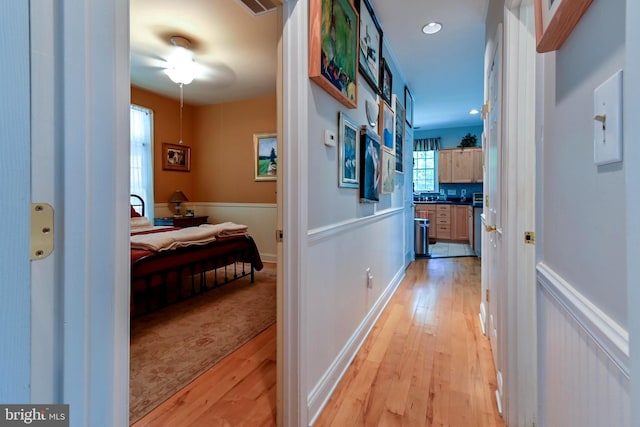 170 Vaughndom Way, Martinsburg, WV 25404 - hall with light wood-style flooring and wainscoting