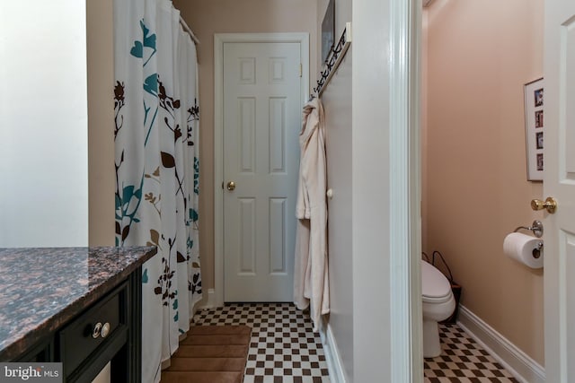 170 Vaughndom Way, Martinsburg, WV 25404 - bathroom with tile patterned floors, toilet, vanity, and baseboards