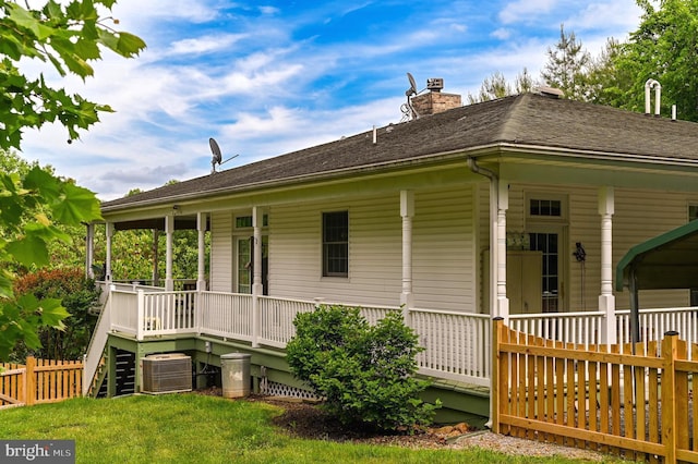 170 Vaughndom Way, Martinsburg, WV 25404 - rear view of house featuring cooling unit, covered porch, and a chimney