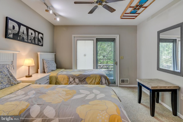 3217 Beech Ridge Dr, Pocono Summit, PA 18346 - carpeted bedroom with access to exterior, rail lighting, baseboards, and ceiling fan