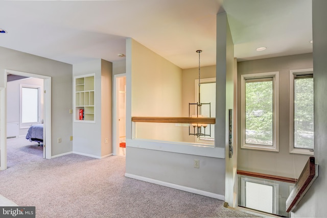3217 Beech Ridge Dr, Pocono Summit, PA 18346 - hall featuring carpet, baseboards, and plenty of natural light
