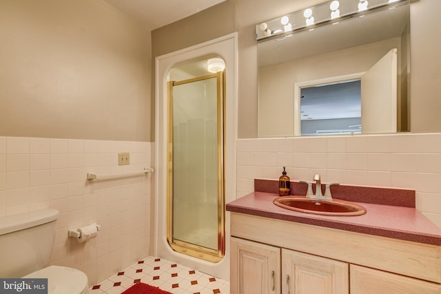 3217 Beech Ridge Dr, Pocono Summit, PA 18346 - full bath featuring tile walls, vanity, a stall shower, toilet, and a wainscoted wall