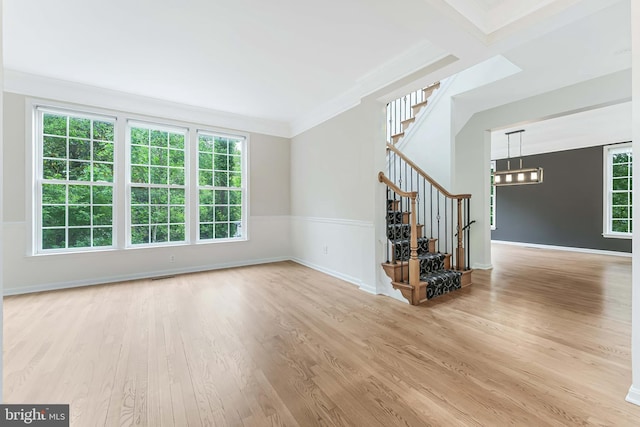 21934 Windover Dr, Broadlands, VA 20148 - empty room featuring stairway, wood finished floors, a chandelier, crown molding, and baseboards