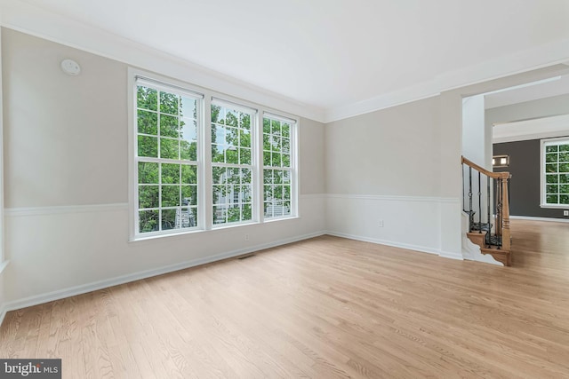 21934 Windover Dr, Broadlands, VA 20148 - empty room with stairs, plenty of natural light, wood finished floors, a smoke detector, and crown molding
