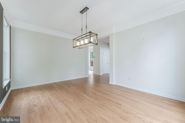 21934 Windover Dr, Broadlands, VA 20148 - spare room with a chandelier, crown molding, light wood-type flooring, and baseboards