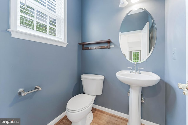 21934 Windover Dr, Broadlands, VA 20148 - half bath featuring toilet, wood finished floors, and baseboards