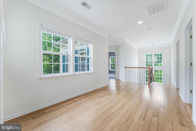 21934 Windover Dr, Broadlands, VA 20148 - spare room with crown molding, light wood finished floors, and baseboards