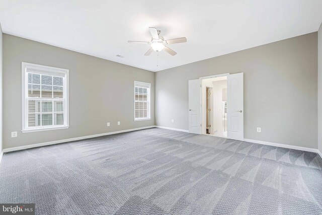 21934 Windover Dr, Broadlands, VA 20148 - empty room with carpet flooring, a ceiling fan, baseboards, and healthy amount of natural light