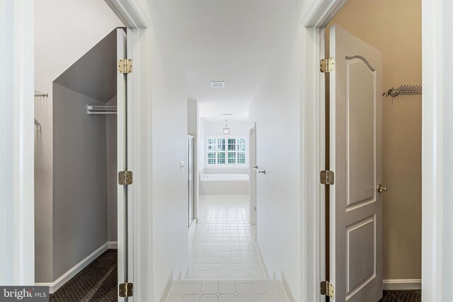21934 Windover Dr, Broadlands, VA 20148 - hall with baseboards and tile patterned flooring