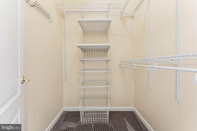 21934 Windover Dr, Broadlands, VA 20148 - walk in closet featuring tile patterned flooring