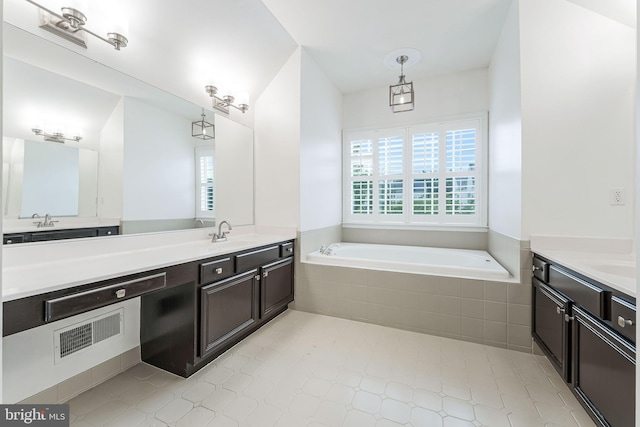 21934 Windover Dr, Broadlands, VA 20148 - bathroom with vanity, healthy amount of natural light, and a garden tub