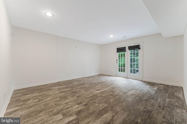 21934 Windover Dr, Broadlands, VA 20148 - spare room featuring wood finished floors, baseboards, and recessed lighting